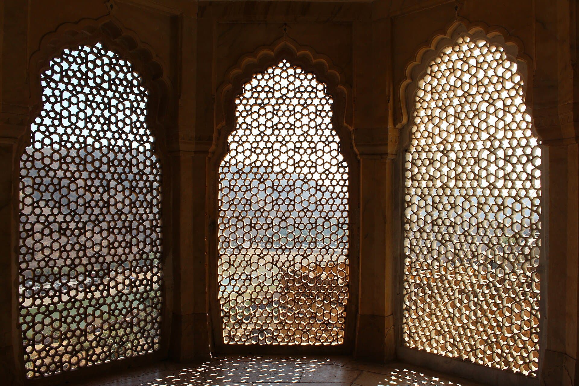 Pierced jali screens with sunlight